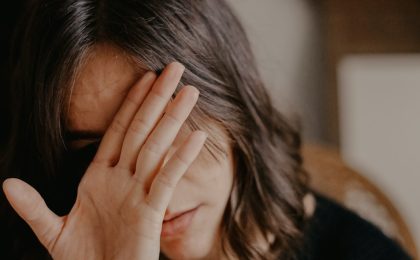 don't let doubt destroy your destiny, girl holding her hand in front of her face